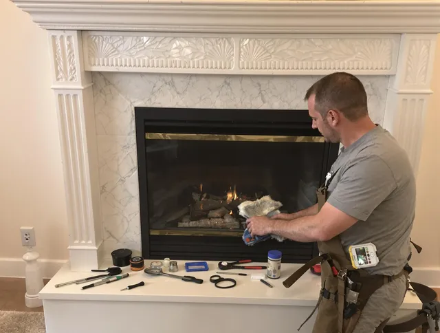 Streetsboro Chimney Sweep performing fireplace maintenance in Streetsboro, OH